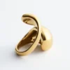 Anillo escultural de doble vuelta