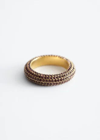 Anillo grueso con pedrería