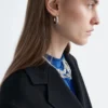 Blazer de lana con cinturón de cuero