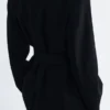 Blazer de lana con cinturón de cuero