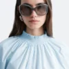 Blusa con cuello alto fruncido