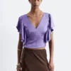 Blusa con cuello en V y volantes