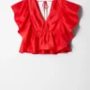 Blusa con cuello en V y volantes