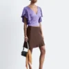 Blusa con cuello en V y volantes