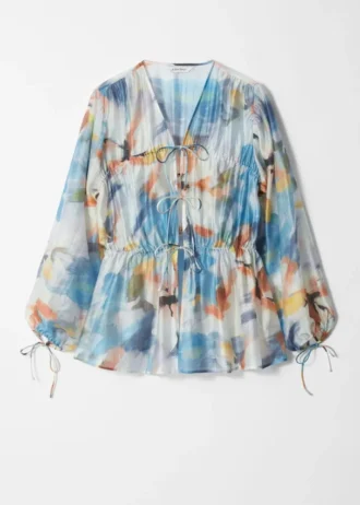 Blusa con fruncidos y cordón