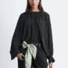 Blusa con mangas abullonadas