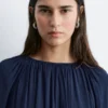 Blusa con mangas abullonadas