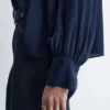 Blusa con mangas abullonadas