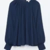 Blusa con mangas abullonadas