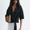 Blusa cruzada