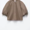 Blusa de algodón con mangas voluminosas