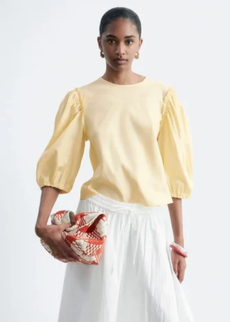 Blusa de jacquard con mangas abullonadas