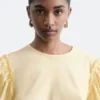 Blusa de jacquard con mangas abullonadas