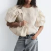 Blusa de jacquard con mangas abullonadas