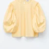 Blusa de jacquard con mangas abullonadas