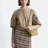 Blusa de mangas abullonadas