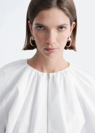 Blusa de popelín de algodón con cremallera frontal