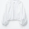 Blusa de popelín de algodón con cremallera frontal