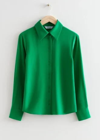 Blusa de seda con botones de concha