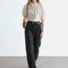 Blusa de seda estampada con cuello lazo