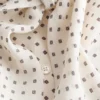 Blusa de seda estampada con cuello lazo