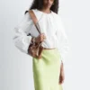 Blusa escultural con cordón