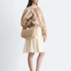 Blusa escultural con cordón