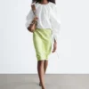 Blusa escultural con cordón
