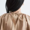 Blusa escultural con cordón