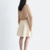 Blusa escultural con cordón