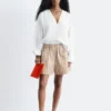 Blusa escultural de algodón con cuello en V