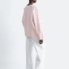 Blusa escultural de algodón con cuello en V