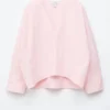 Blusa escultural de algodón con cuello en V