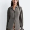 Blusa fruncida con lazo en la espalda