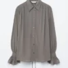 Blusa fruncida con lazo en la espalda
