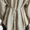 Blusa fruncida con lazo en la espalda