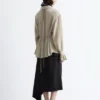 Blusa fruncida con lazo en la espalda