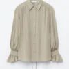 Blusa fruncida con lazo en la espalda