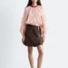 Blusa voluminosa con detalle de lazos