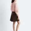 Blusa voluminosa con detalle de lazos