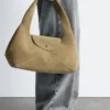 Bolso de hombro curvo