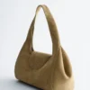 Bolso de hombro curvo