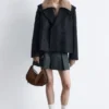 Bolso de hombro de ante con flecos