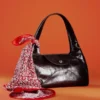 Bolso de hombro de cuero curvado