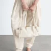Bolso de hombro de piel de perfil bajo