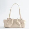 Bolso de hombro de piel de perfil bajo