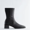 Botas de calcetines de cuero