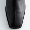 Botas de calcetines de cuero