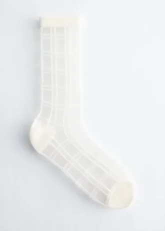 Calcetines transparentes a cuadros