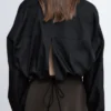Camisa corta con cordón